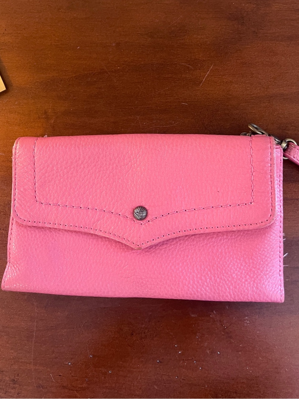 The Sak brand Pink wristlet